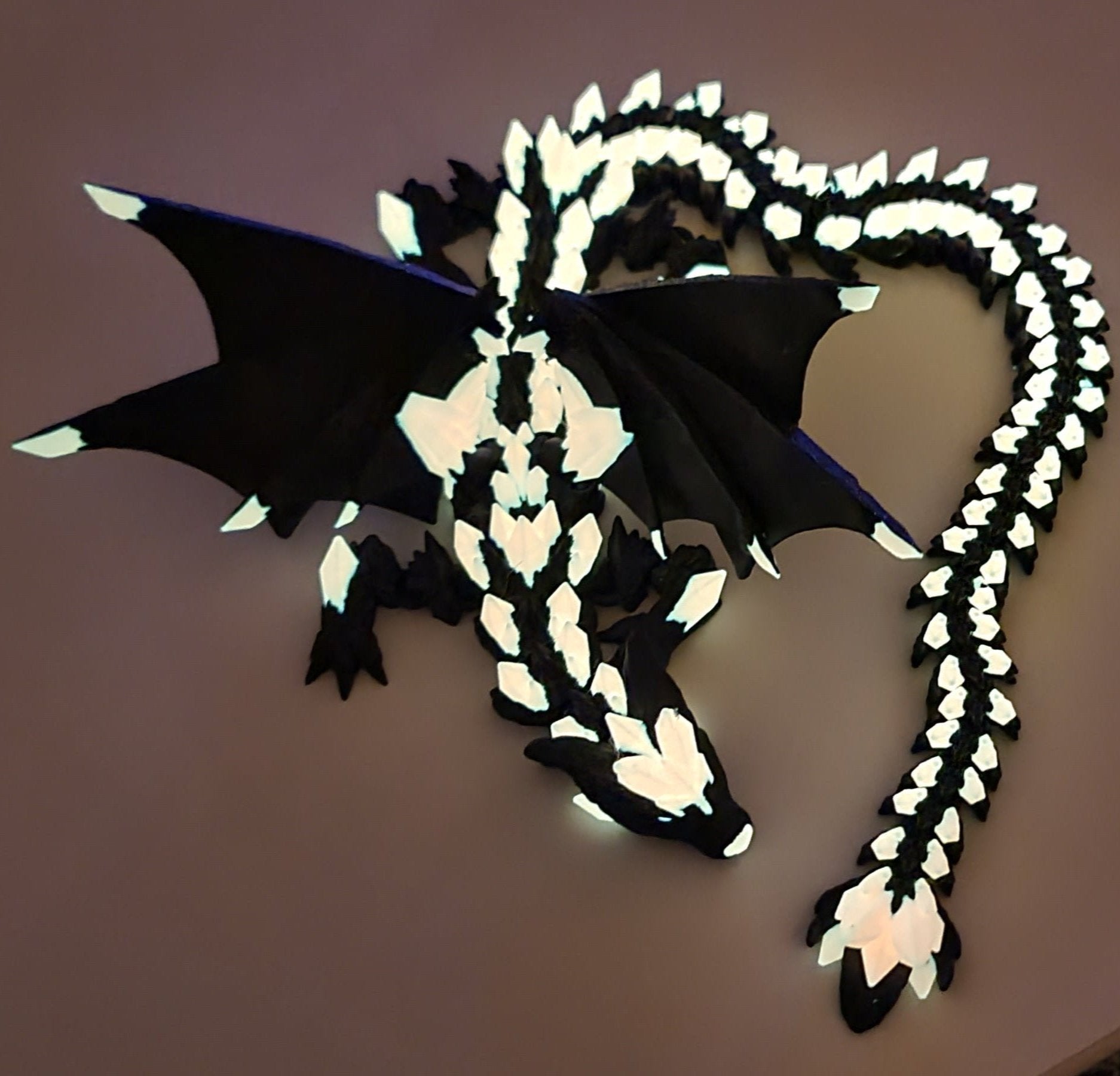 Black dragon with white glowing crystals.