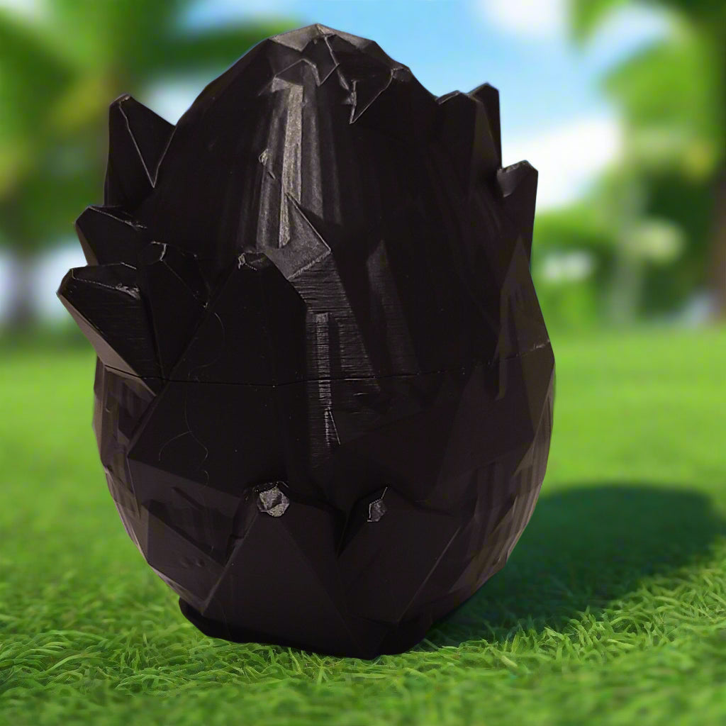 lush green grass with trees in the background and a crystal Dragon egg setting on the grass.