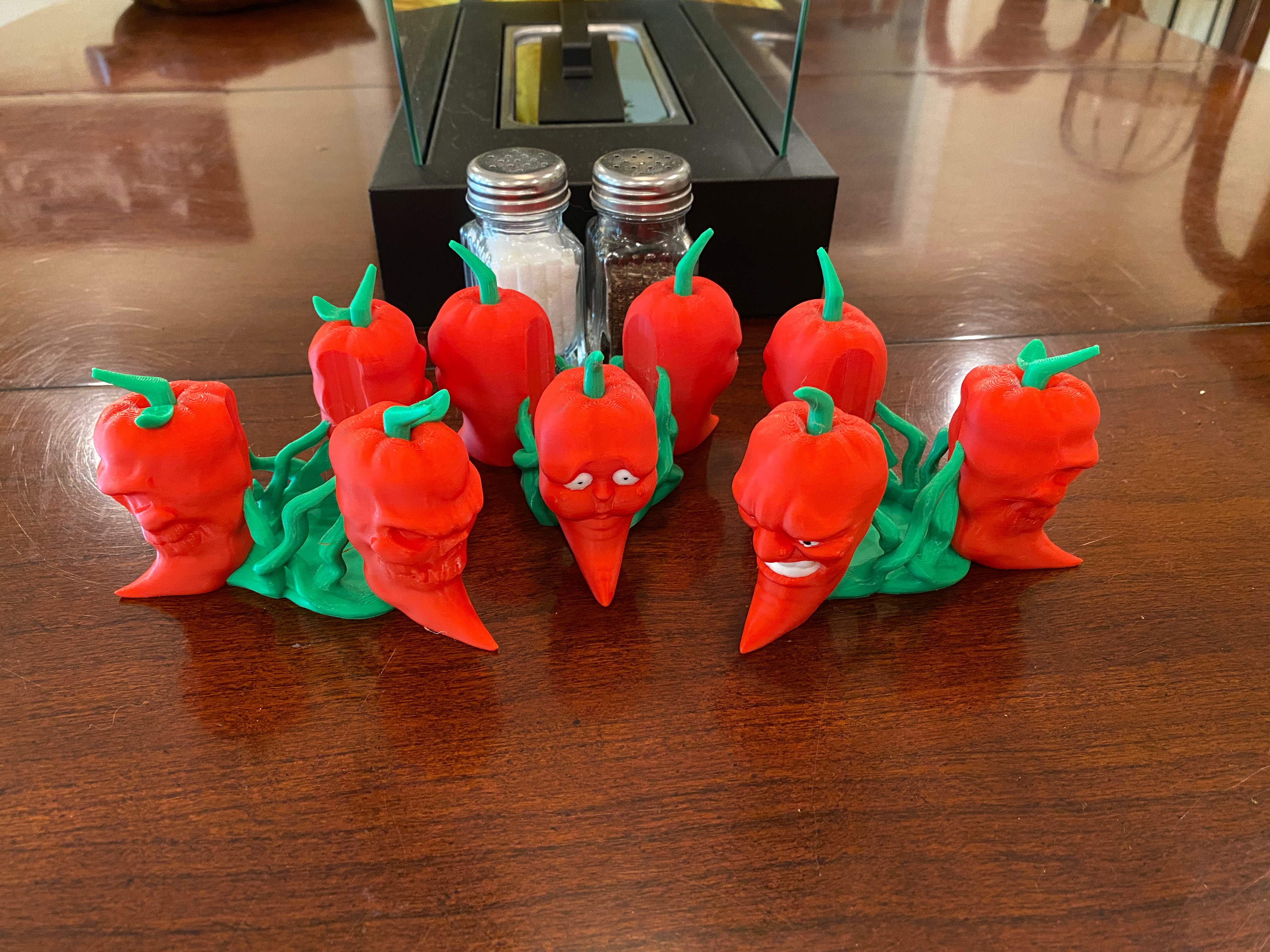 Showing the three variations of pepper that are shown in the heat range tobasco holder. Why not show what reaction you think most people have to the tobasco sauce?