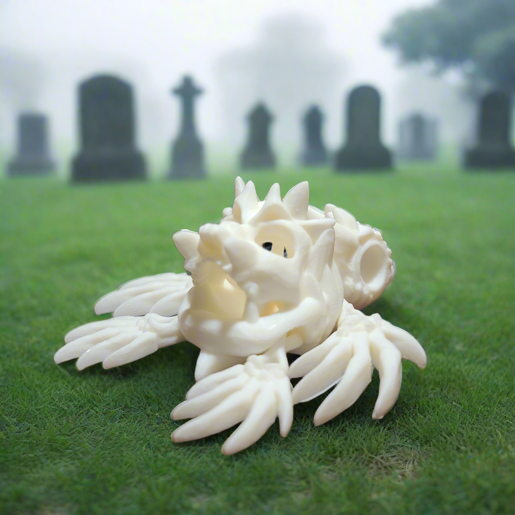 white hollow turtle fidget with bones for fins, and a skull for a shell