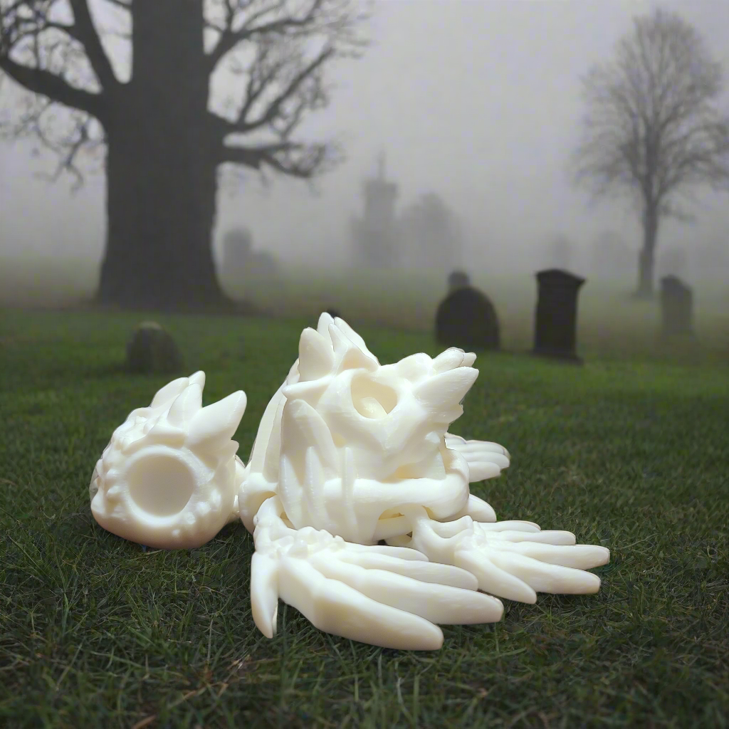 white hollow turtle fidget with bones for fins, and a skull for a shell