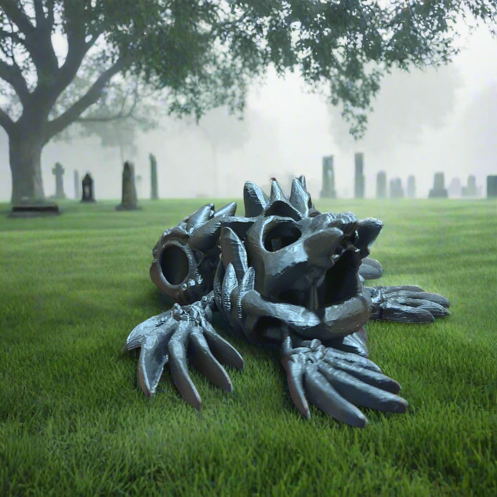 black hollow turtle fidget with bones for fins, and a skull for a shell