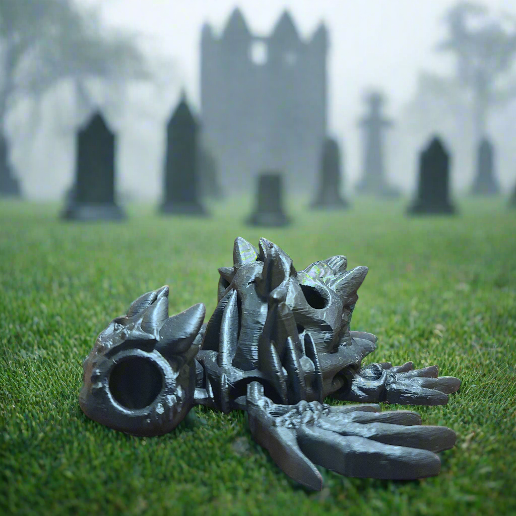 black hollow turtle fidget with bones for fins, and a skull for a shell