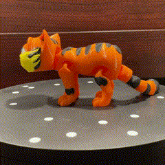 Orange flexicat on revolving table in motion