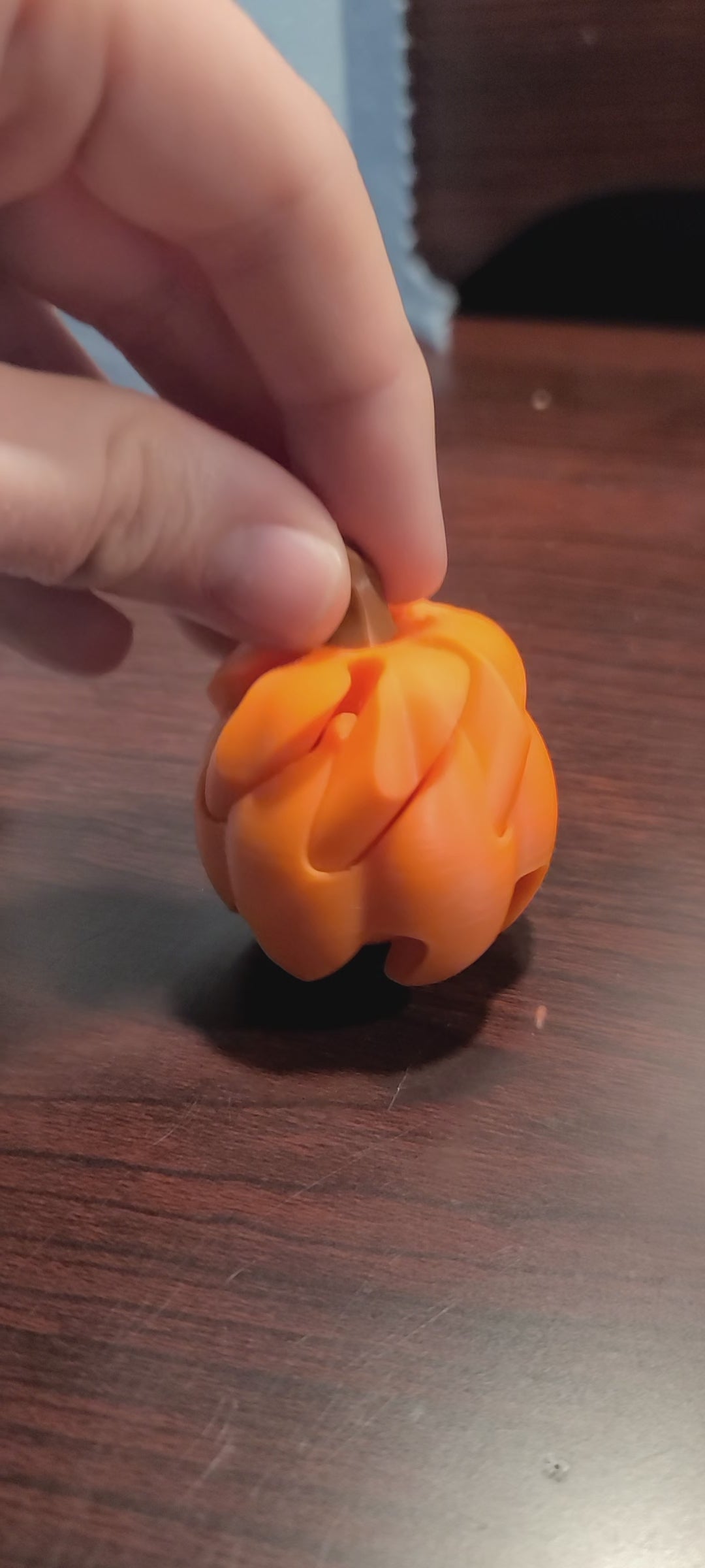 impossible passthrough fidget shaped like pumpkin