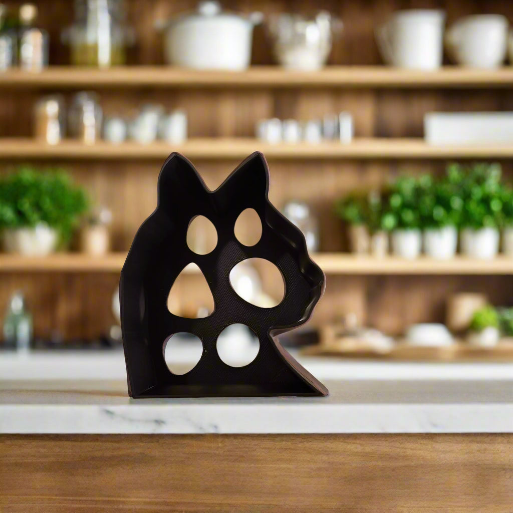 cat shaped cookie cutter on a kitchen counter