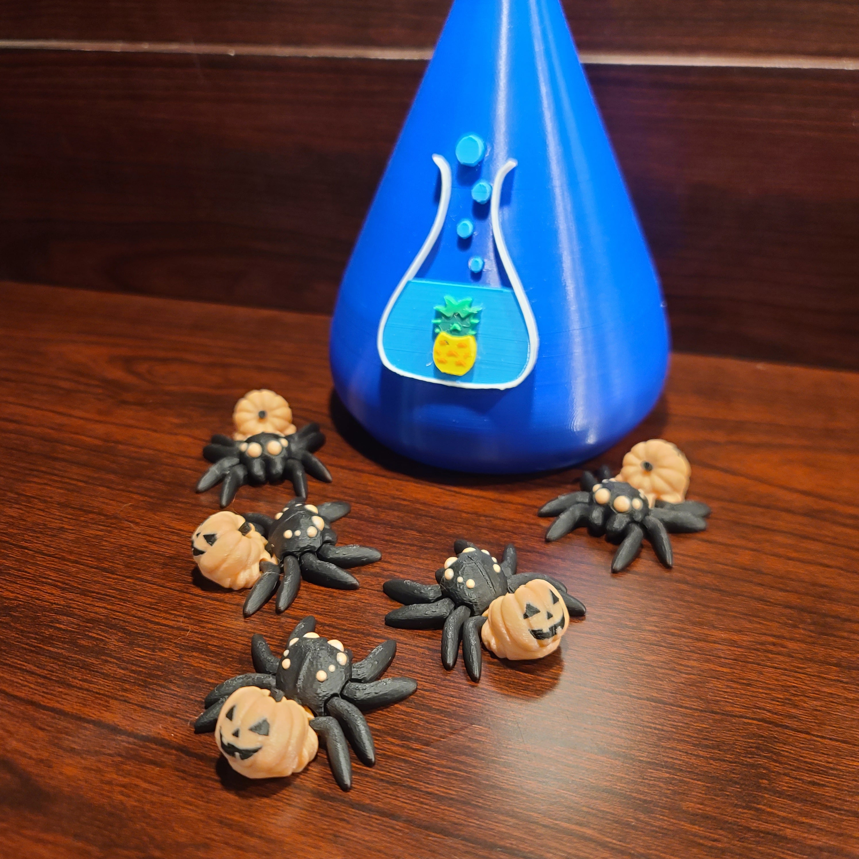 Spiders with pumpkin bodies
