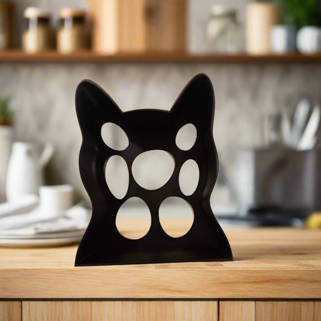 cat shaped cookie cutter on a kitchen counter