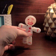 White and red gingerbread being moved around to show flexibility.
