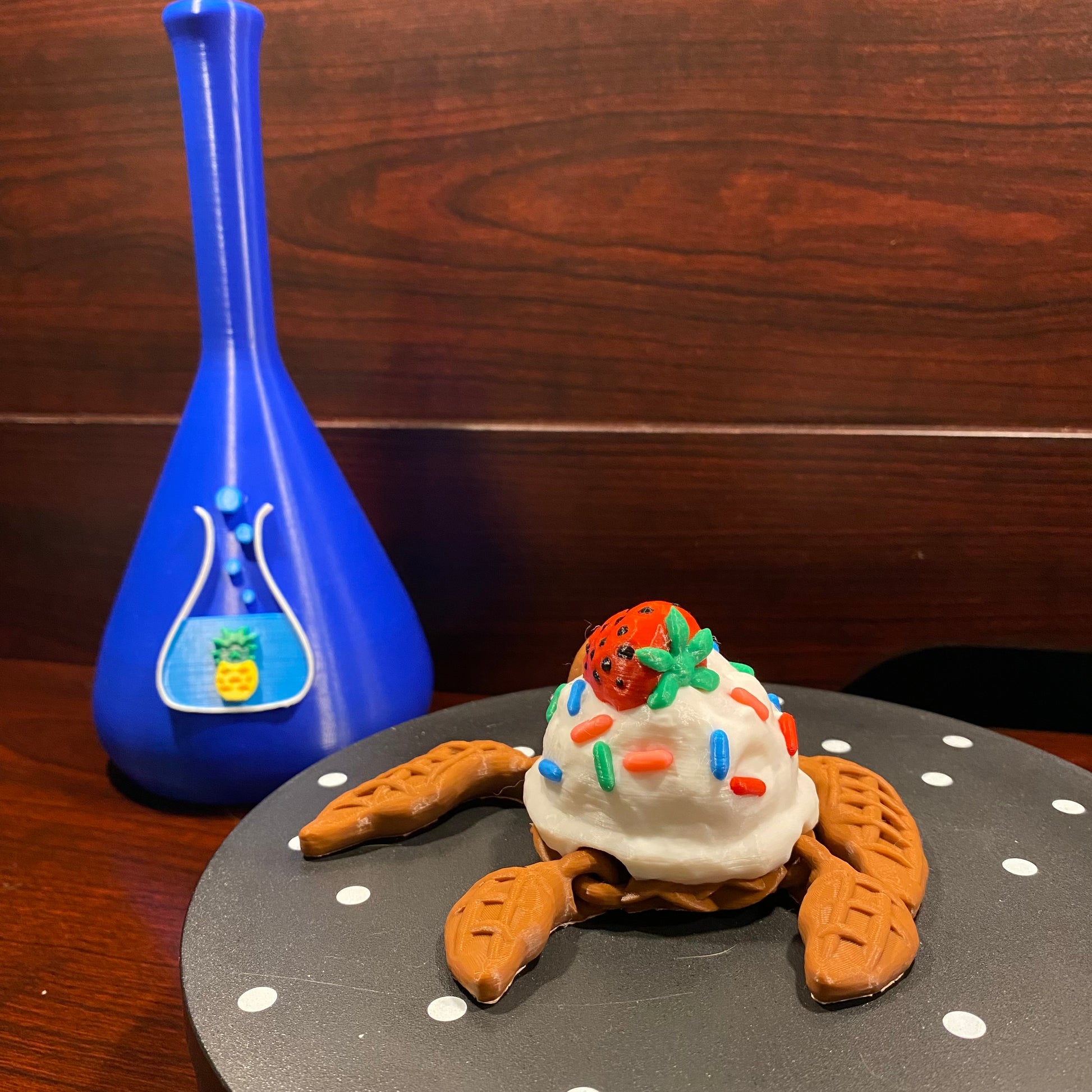 ice cream scoop turtle shell with strawberry on top