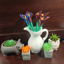 Cala Lilly plant pens with red and blue flowers. Manufactured by Chuganation’s 3d lab.
