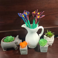 Cala Lilly plant pens with red and blue flowers. Manufactured by Chuganation’s 3d lab.