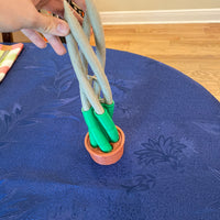 person holding bambu from the bambu passthrough fidget higher to showcase the fidget.