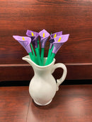 A cala lilly plant pen set inspired by the cala lilly plant. With purple and lilac flowers. Manufcatured by chuganations 3D Lab in abbeville alabama, located in the united states of america.