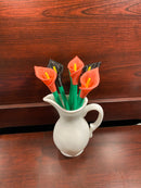 A cala lilly plant pen set inspired by the cala lilly plant. With pink and black flowers. Manufcatured by chuganations 3D Lab in abbeville alabama, located in the united states of america.
