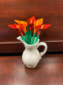A cala lilly plant pen set inspired by the cala lilly plant. With orange and red flowers. Manufcatured by chuganations 3D Lab in abbeville alabama, located in the united states of america.