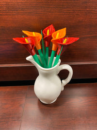 A cala lilly plant pen set inspired by the cala lilly plant. With orange and red flowers. Manufcatured by chuganations 3D Lab in abbeville alabama, located in the united states of america.