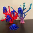deep blue octopi on a corral reef. All of the items in the photo were manufactured by Chuganation's 3D Lab. 