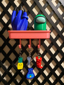 trellis mounted tray and hooks in a glow pink color. manufactured by chuganations 3d lab